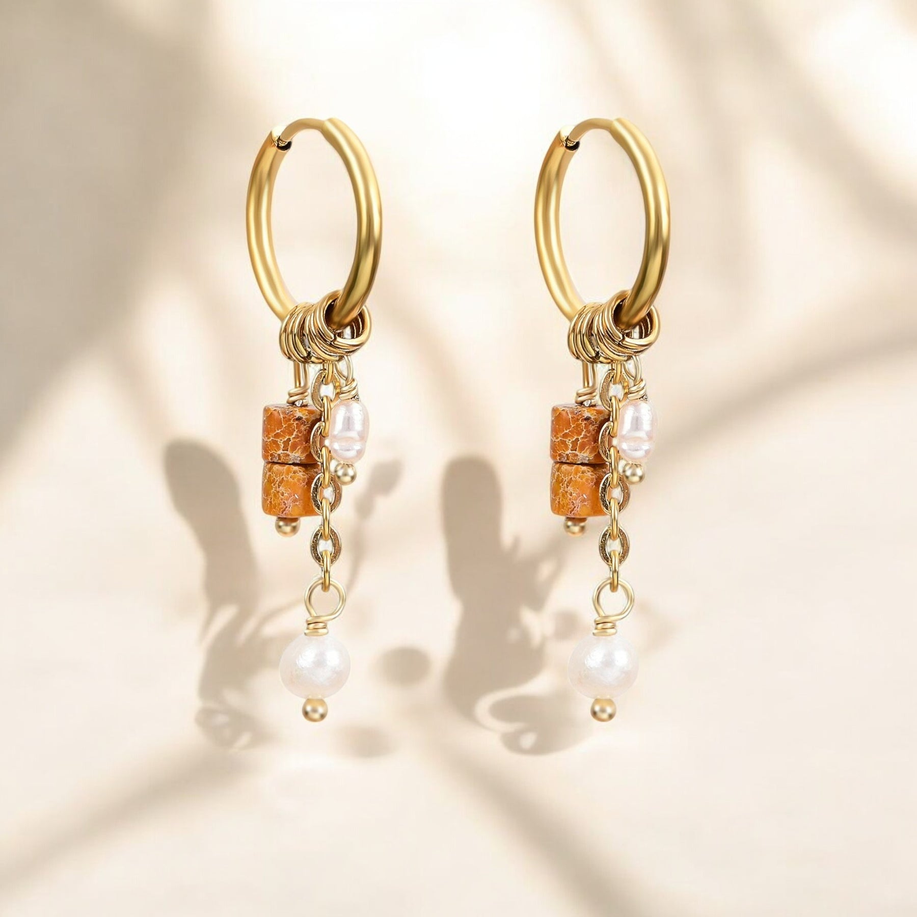 Pendientes de aro con gota de flor de óxido dorado