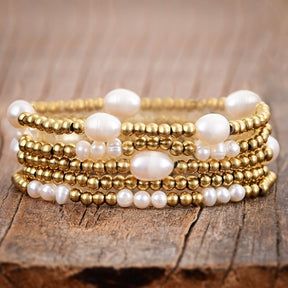 Conjunto de pulseras de oro y perlas