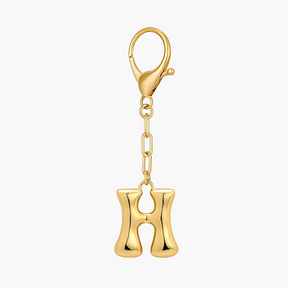 Llavero de letra inicial burbuja y charm para bolso