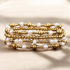 Conjunto de pulsera de perlas con brillo dorado