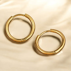Pendientes de aro dorados Gleam