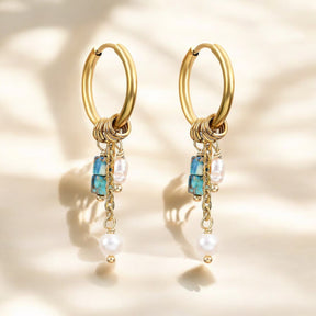 Pendientes de aro con colgante de flor de turquesa dorada