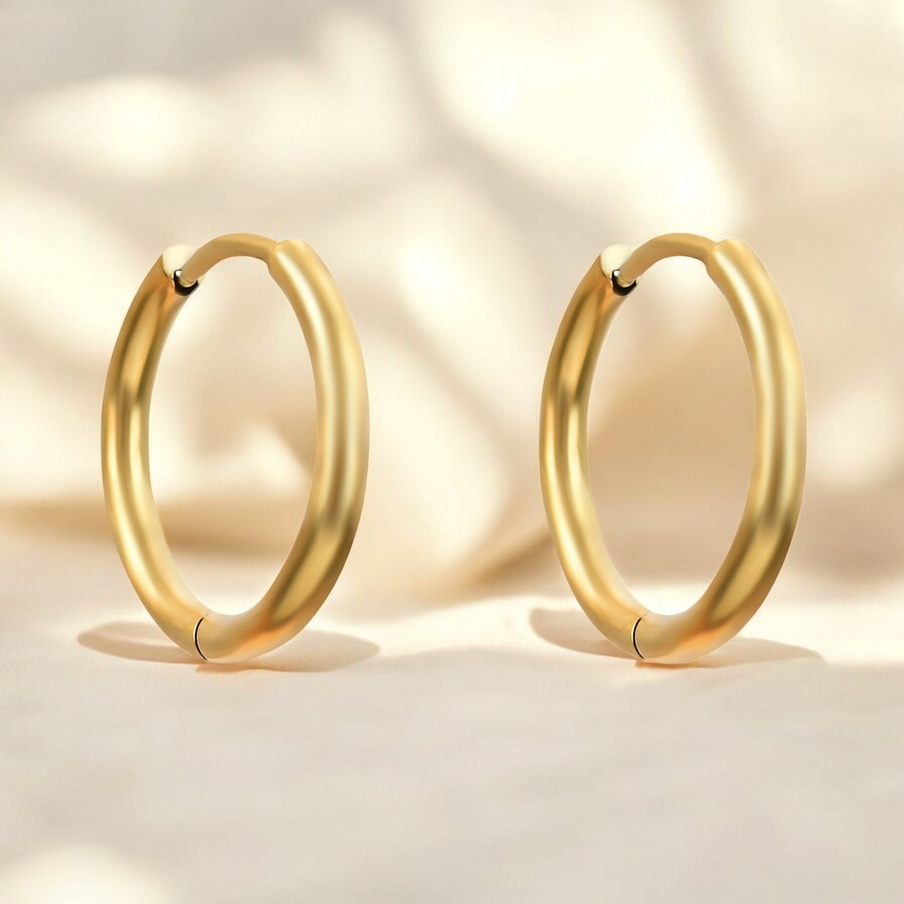 Pendientes de aro dorados Gleam