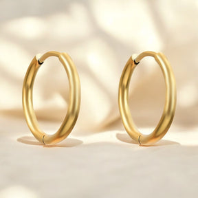 Pendientes de aro dorados Gleam